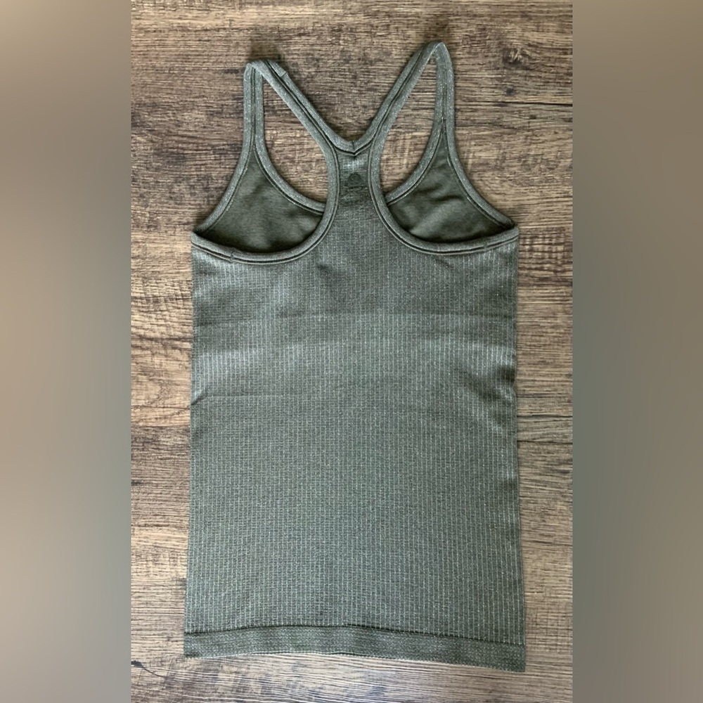 Lululemon ~ EBB TO STREET TANK ~ * SHINE *
Olive~Silver *SHINE* - Picture 3 of 12